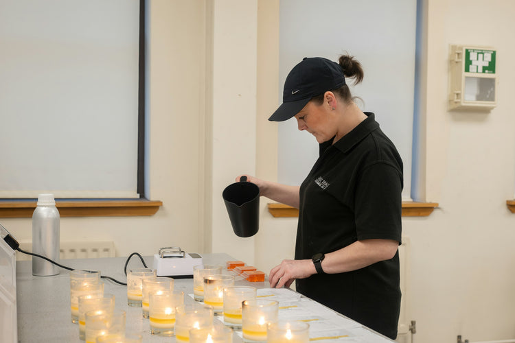 Pouring candles in the lab